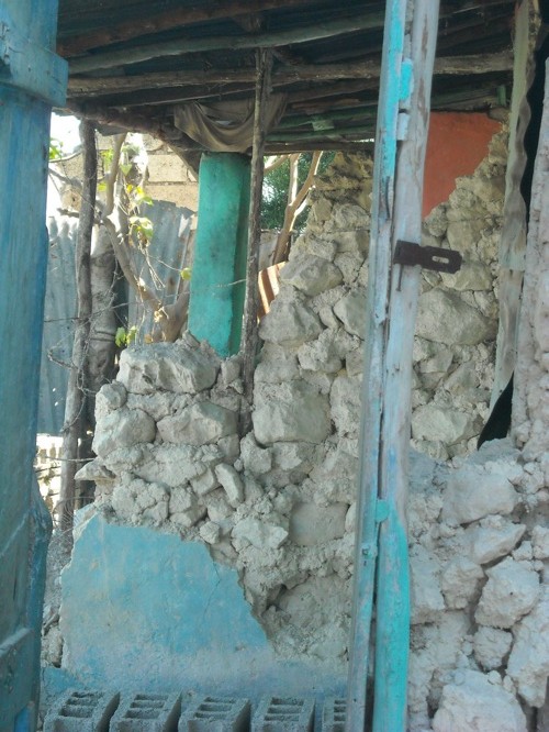 Sticks Inside a damaged home above Port-au-Prince Haiti