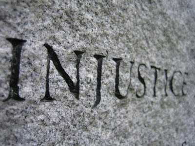 injustice engraved