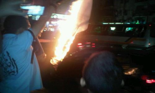 Egypt protester burning flag crucified opponents