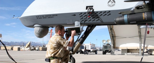 a service man works with a drone