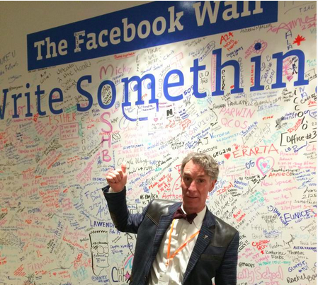 Bill Nye stands at The Facebook Wall